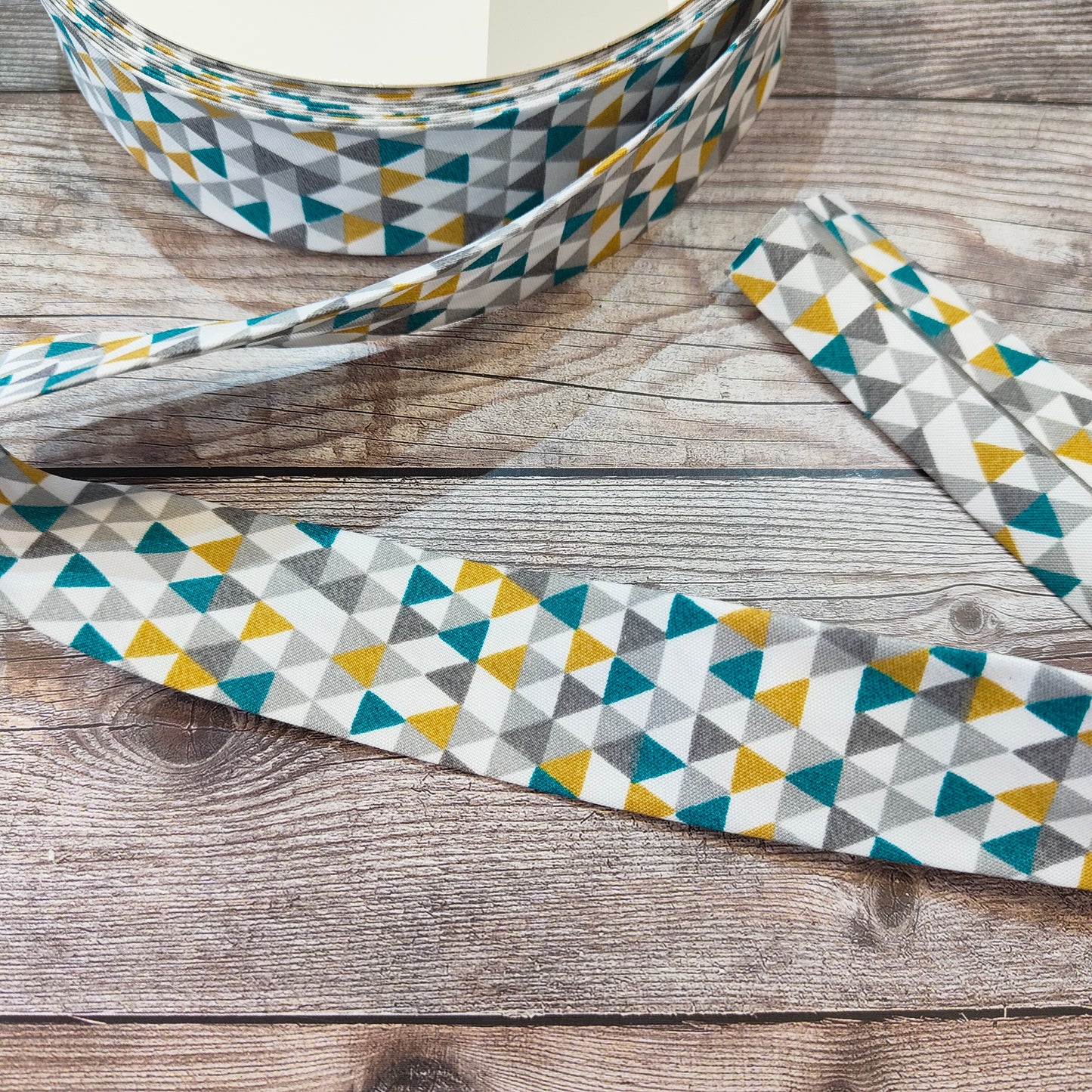 Geometric Teal Bias Binding