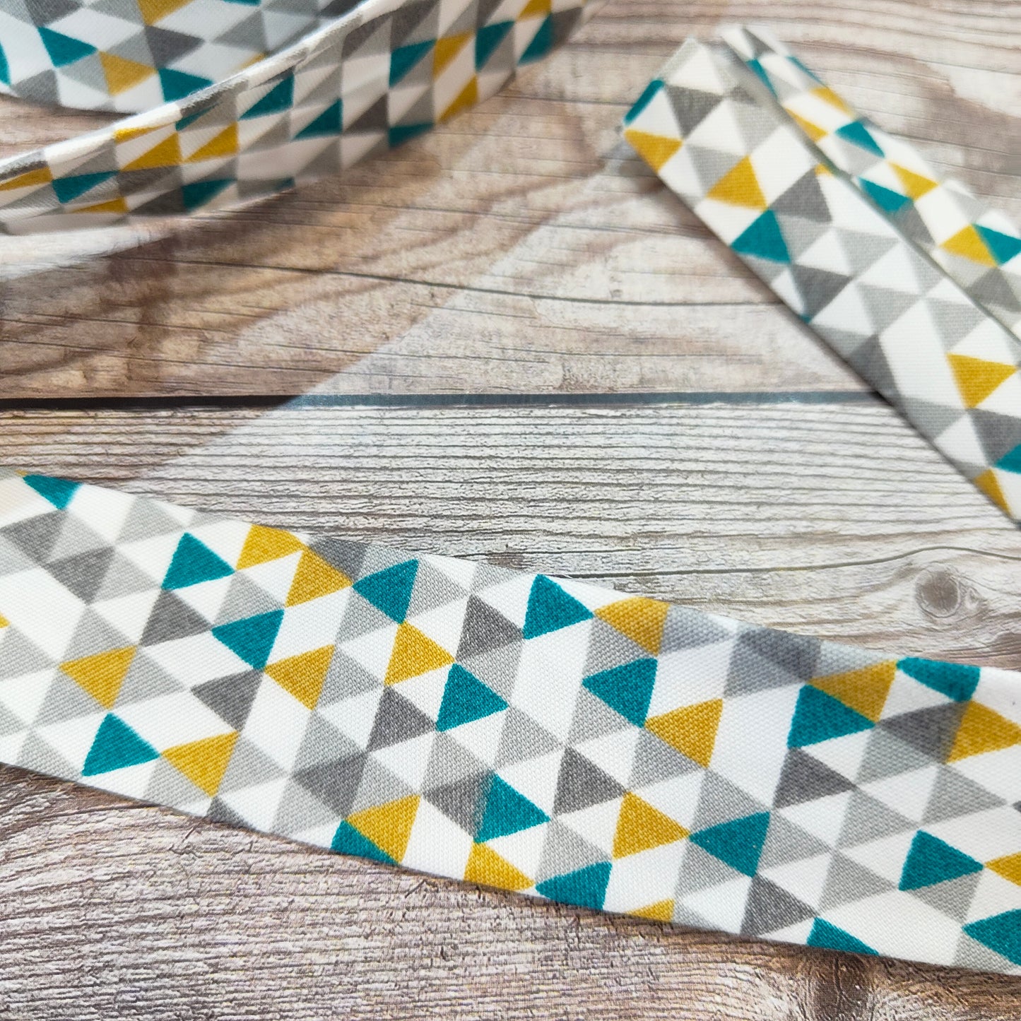 Geometric Teal Bias Binding