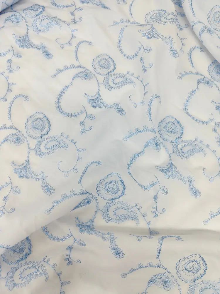 Blue Embroidery On White New In