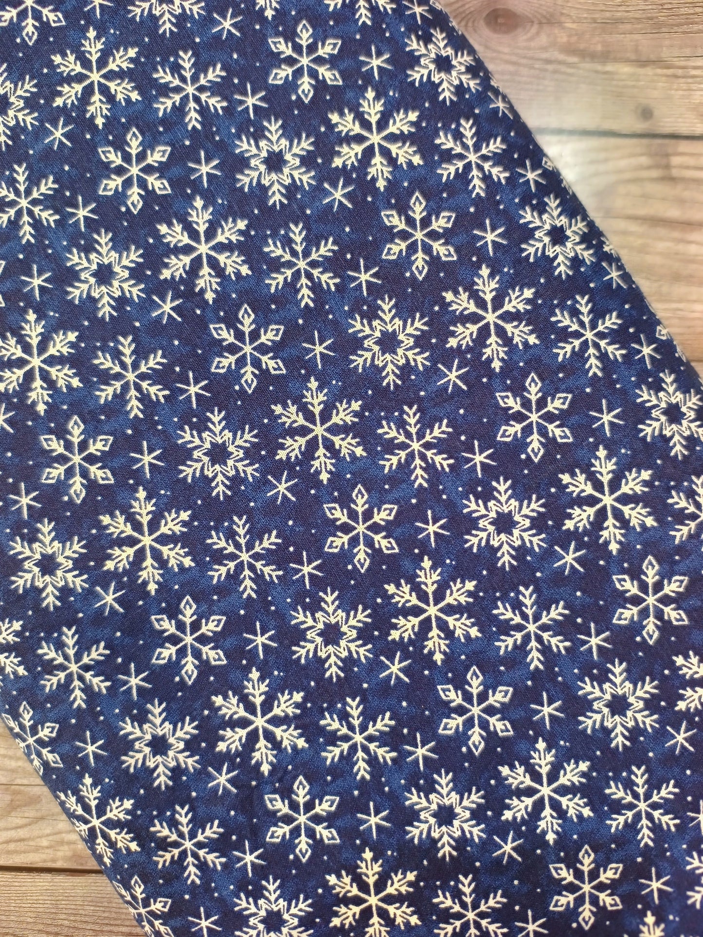 White Snowflakes on Blue Cotton