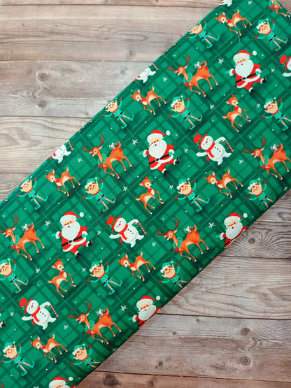 Santa on Green Cotton