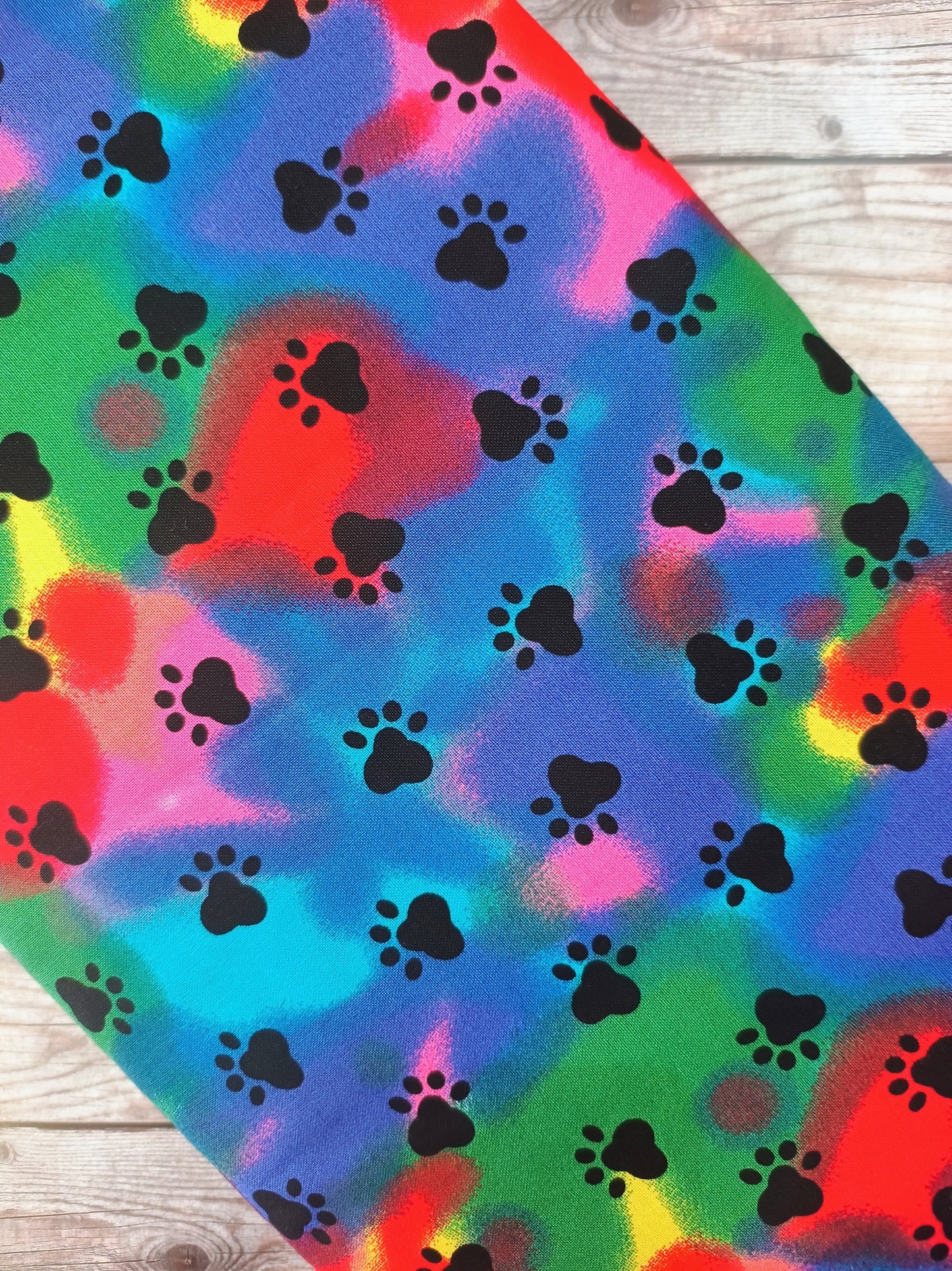 Paw Prints on Rainbow Cotton