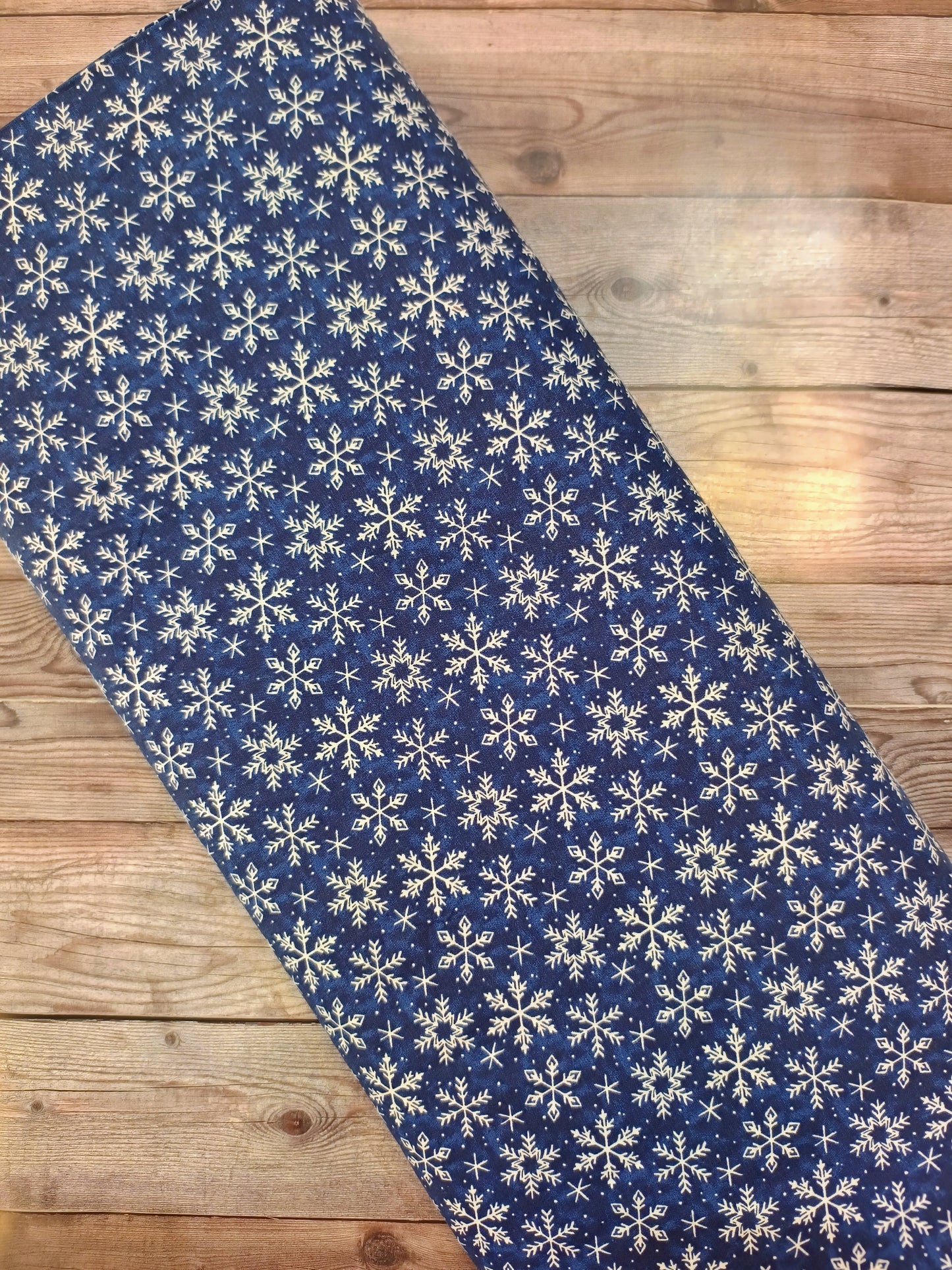 White Snowflakes on Blue Cotton