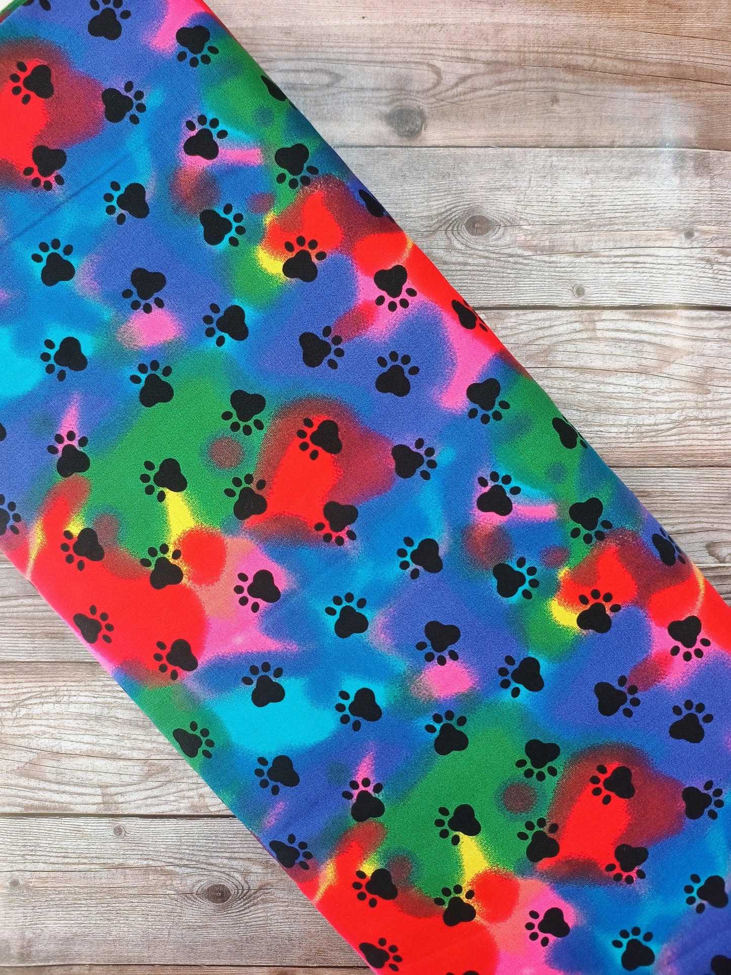 Paw Prints on Rainbow Cotton
